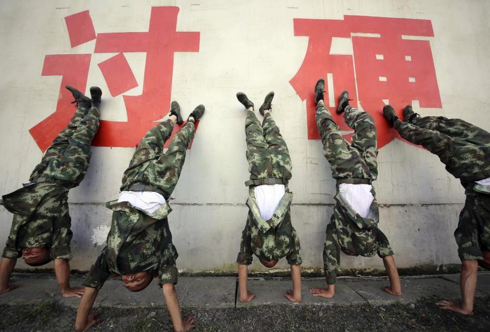 تصاویر : آموزش سخت نظامیان در چین‎